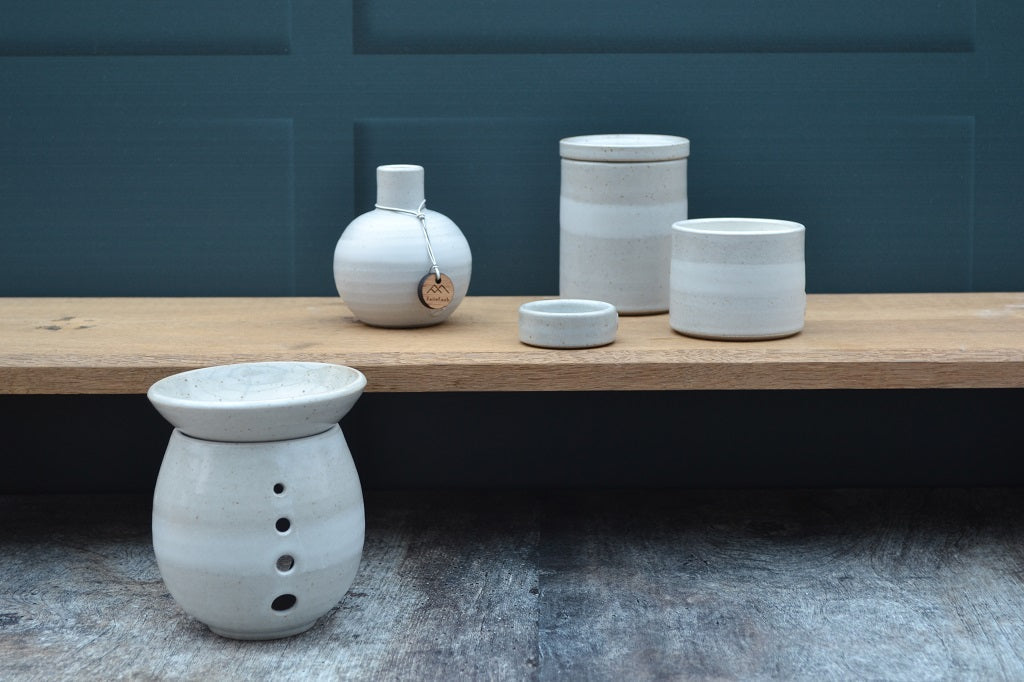 A stoneware collection in a Mist glaze of candles, burners, diffusers and tealights all of which have been thrown by hand in the Cambrian Mountains of Mid Wales
