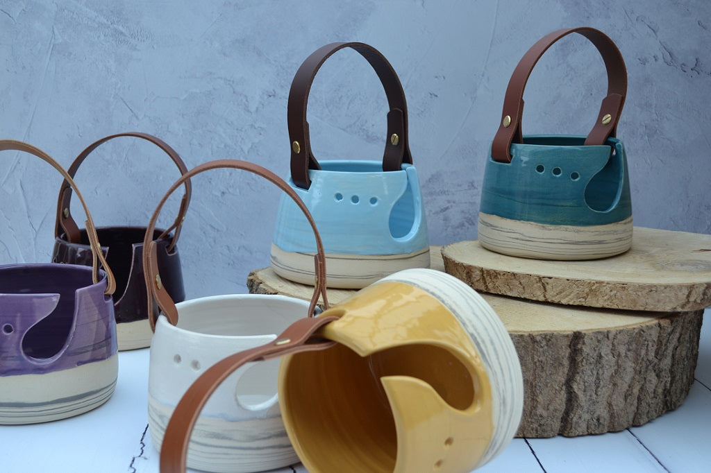Yarn bowls, wool bowls or knitting bowls with our unique and distinctive leather handles.