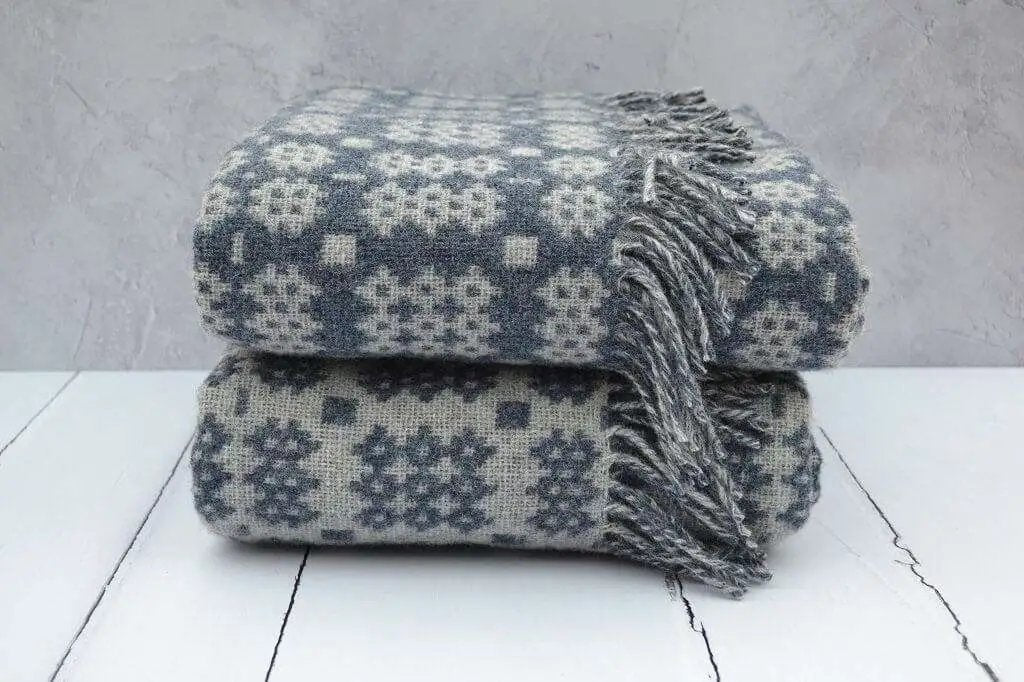 Welsh blankets - hand woven in Wales with pure new wool. Nothing says Hiraeth more than an iconic Welsh blanket