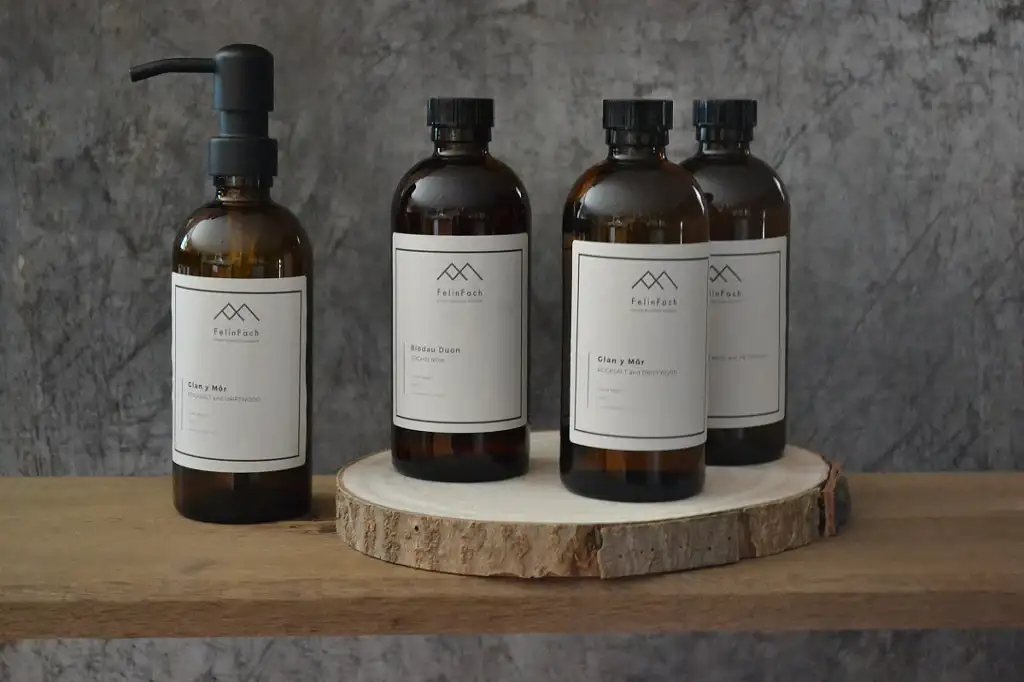 Hand Wash Hand Lotion Set in amber apothecary style glass bottles with metal pump