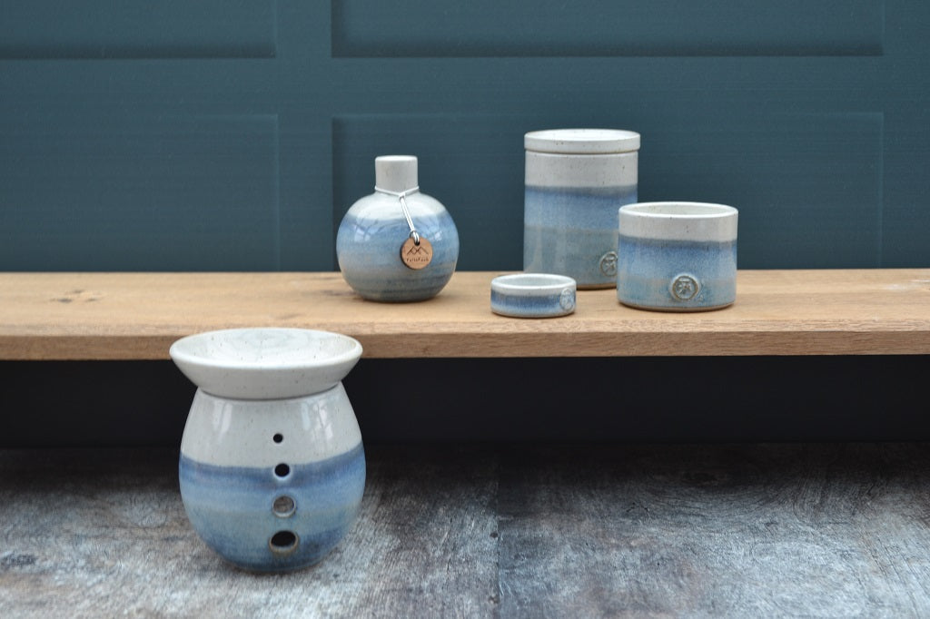 A stoneware collection in a Sky Blue glaze of candles, burners, diffusers and tealights all of which have been thrown by hand in the Cambrian Mountains of Mid Wales