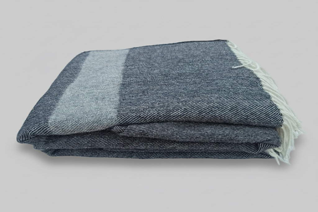 Welsh blanket, Pembroke. Grey herringbone colours with off white fringes. 