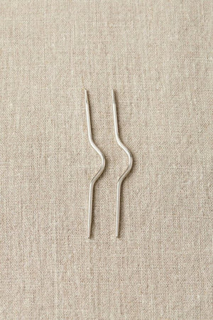 Cocoknits Curved Cable needles - Made with the knitter's true needs in mind, Cocoknits has a smart range of knick-knacks designed to keep your yarn projects on track.  There is also a brilliant selection of stitch markers so you always know your place