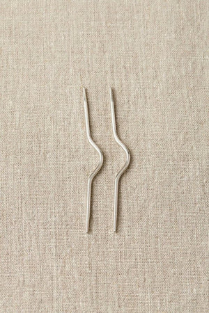 Cocoknits Curved Cable needles - Made with the knitter's true needs in mind, Cocoknits has a smart range of knick-knacks designed to keep your yarn projects on track.  There is also a brilliant selection of stitch markers so you always know your place