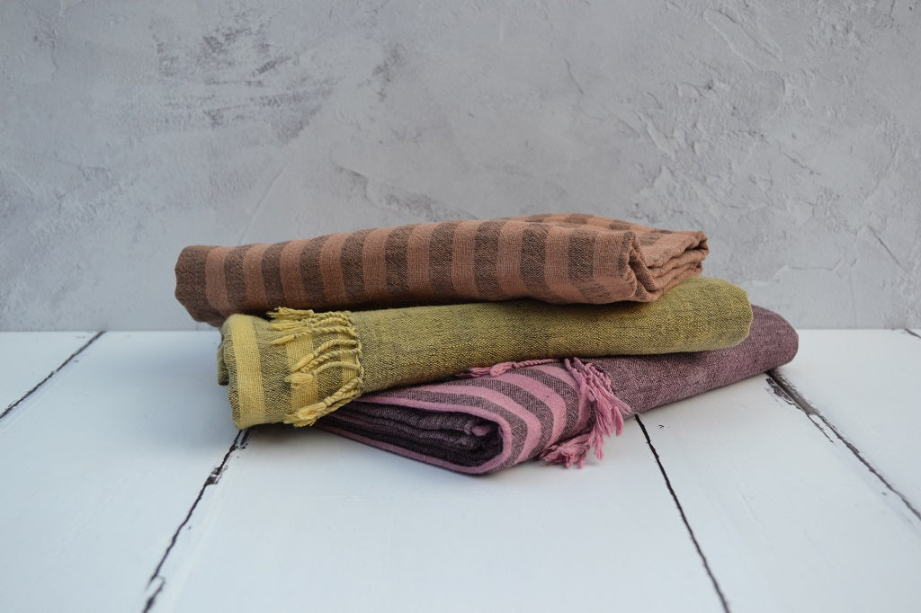 Handwoven organic cotton scarves. Hand dyed with natural dyes using Cutch, Logwood, Madder/Cochineal and Osage