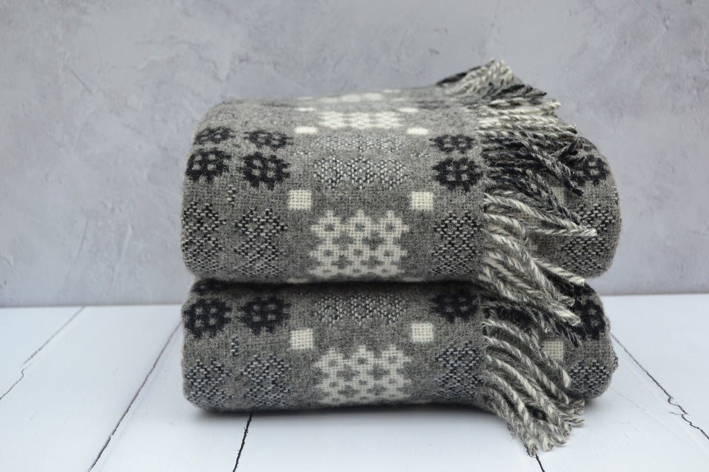 Welsh blanket - Cwm Elan, in grey, black and off-white colours and in the Caernarfon Portcullis patterns