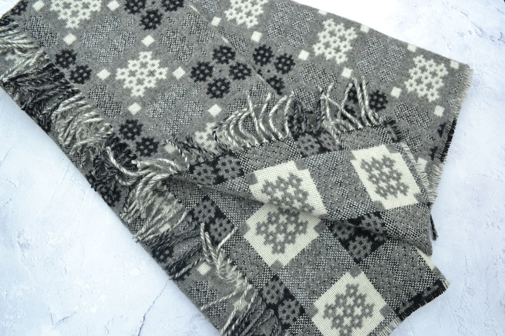 Welsh blanket - Cwm Elan, in grey, black and off-white colours and in the Caernarfon Portcullis pattern