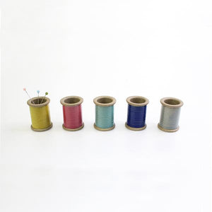 Cohana - Hasami Magnetic Pin Holder - Each pin holder is finished with a colourful glaze to resemble a real spool of thread. The pin holder's magnet holds metal objects securely both on the inside and the exterior 