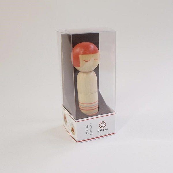 Cohana - Kokeshi Doll Pin Cushion - Designed as the traditional shape and bobbed hair of the kokeshi. The doll's base is magnetic to easily pick up fallen pins and needles. Each doll opens to reveal a pincushion and comes with three quality needles (pink)